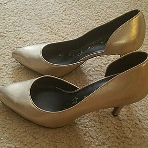 Gold pointed toe stilletoes